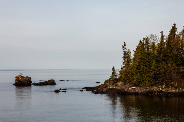 Island with rocks in the sea at Nova Scotia - Photo, image