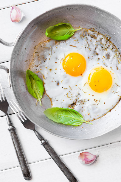 Two fried eggs rustic breakfast - Photo, Image