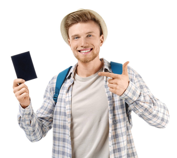 白い背景にパスポートを持つ若い観光客 - 写真・画像