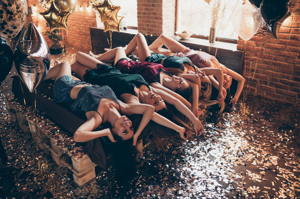 Nice attractive lovely charming glamorous luxury chic feminine cheerful glad ladies lying on bed wearing lingerie sleep wear birthday prom in loft industrial style interior room house - Photo, image