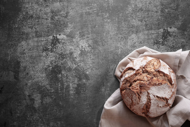 Homemade bread on gray background. Top view - Foto, imagen