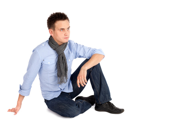 Casual Man Sitting on the ground - Foto, imagen