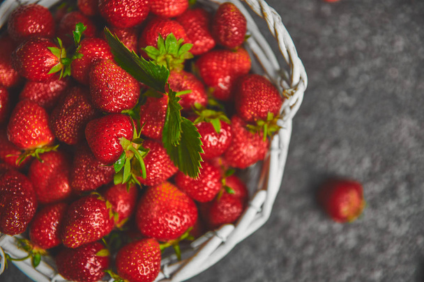 Strawberries in white basket. Fresh strawberries. Beautiful strawberries. - Photo, Image