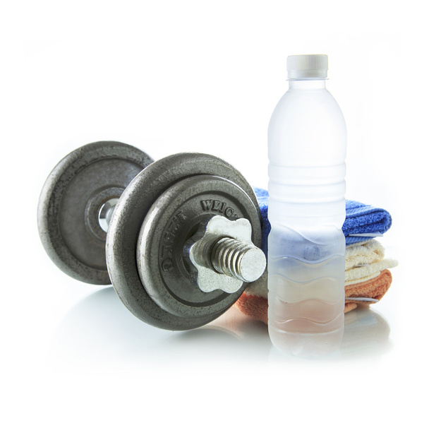 Dumbbell with water and towel - Photo, Image