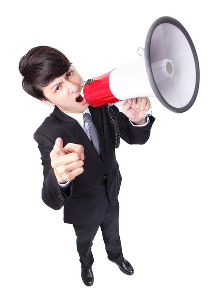Business man screaming loudly in a megaphone - Foto, Imagem