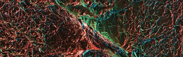 panoramic shot of foil with colorful lighting reflection - Foto, Imagem