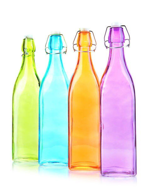 Empty color glass bottles, isolated on white - Foto, imagen