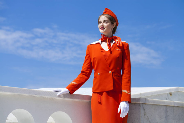 RUSSIA, SAMARA: 19 JULE 2019. Beautiful stewardess dressed in of - Fotoğraf, Görsel