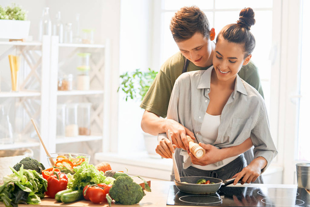 loving couple is preparing the proper meal - Photo, Image