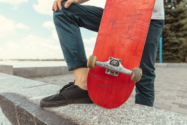 Skateboarder at the citys street in sunny day - Fotografie, Obrázek
