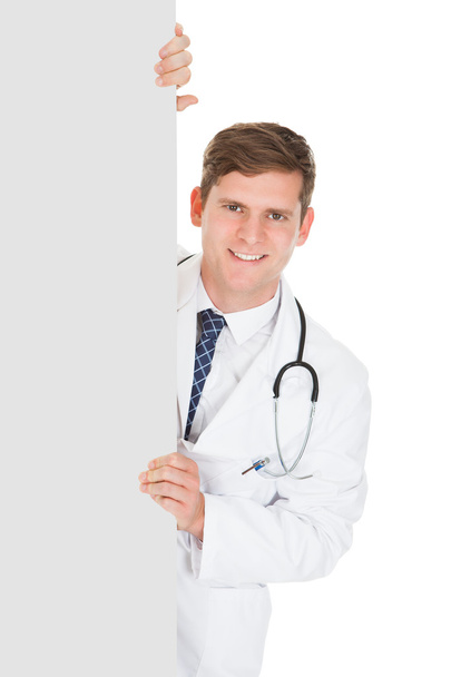 Male Doctor Holding Blank Placard - Photo, image