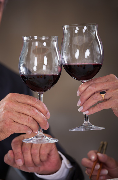 Mature Couple Toasting Wine - Foto, immagini