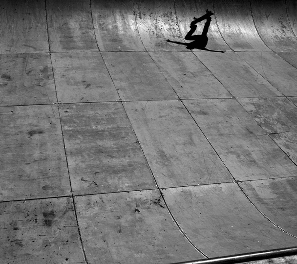 shadow of one skater jumping in a ramp  - Photo, Image