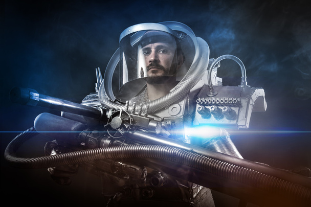 Astronaut, fantasy warrior with huge space weapon - Foto, imagen
