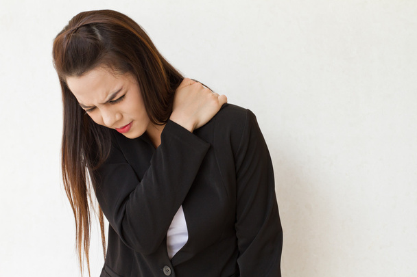 Dolor de hombro pesado o rigidez de la ejecutiva de negocios femenina
 - Foto, Imagen