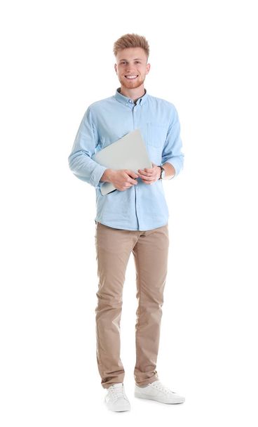 Young man with laptop on white background - Foto, imagen