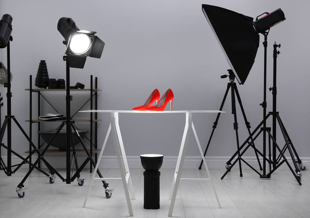Professional photography equipment prepared for shooting stylish shoes in studio - Photo, Image