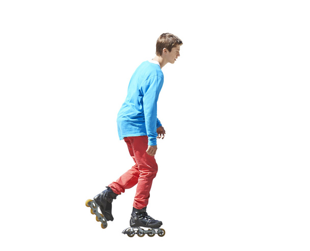 Portrait a teenager on rollers isolated on white background - Fotó, kép