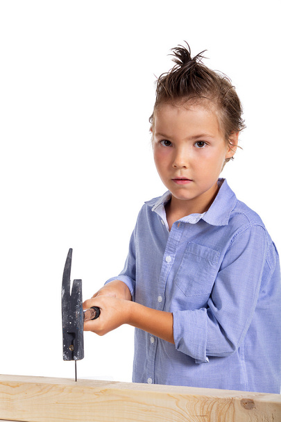 Child works with hammer - Photo, Image