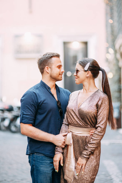 Happy couple at sunset in Italy. Evening summer photo shoot in Rome.  - Foto, Imagem