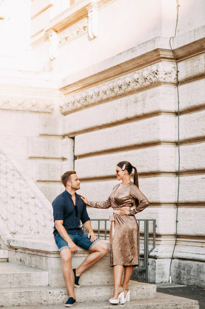 Happy couple at sunset in Italy. Evening summer photo shoot in Rome.  - 写真・画像