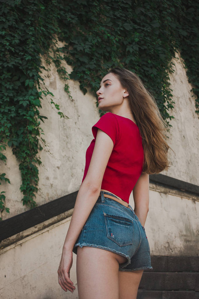 Sexy girl in red t-shirt - Valokuva, kuva