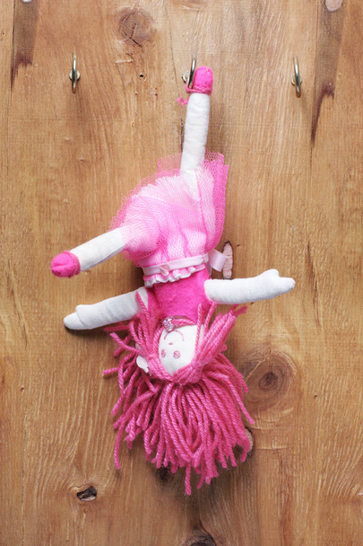 Una bambola rosa
  - Foto, immagini