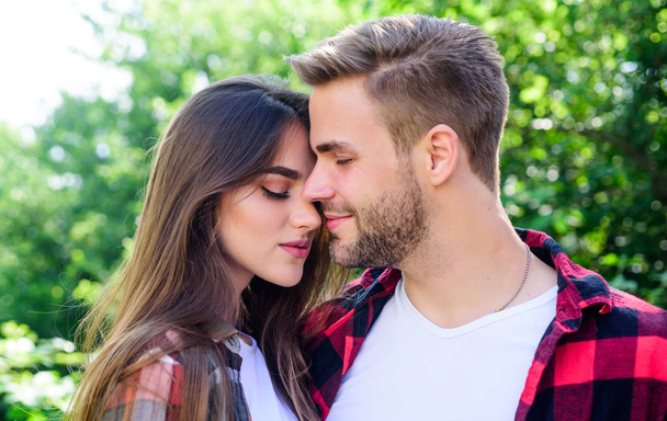 Doing everything together. hipster couple outdoor. man and woman in checkered shirt relax in park. valentines day. summer camping in forest. family weekend. romantic date. couple in love. Hiking - Foto, Bild