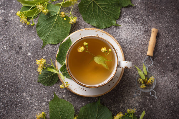 Healthy hot linden tea in cup - Photo, Image
