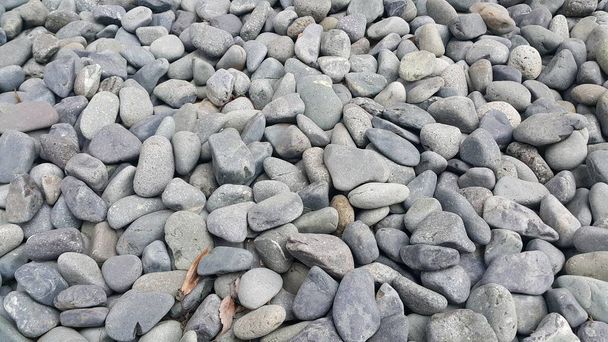 テクスチャの背景:岩の小石、小さな、丸みを帯びた、滑らかなピブル - 写真・画像
