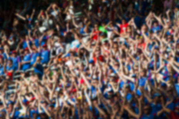 Blurred crowd of spectators on a stadium - Photo, Image