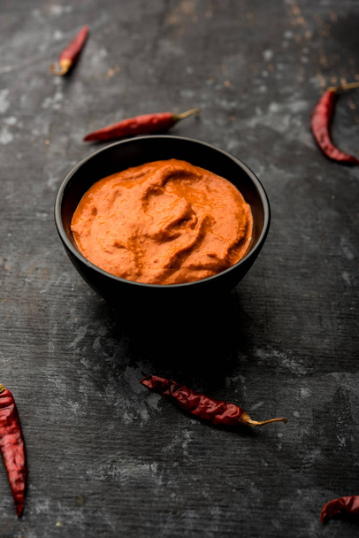 Peri Peri Sauce in a bowl, originally from portugal, it's a hot sauce made using piri piri or African bird's eye chillies.  selective focus - Фото, изображение