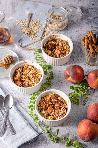 Baked oatmeal with fruit and maple syrup  - Фото, зображення