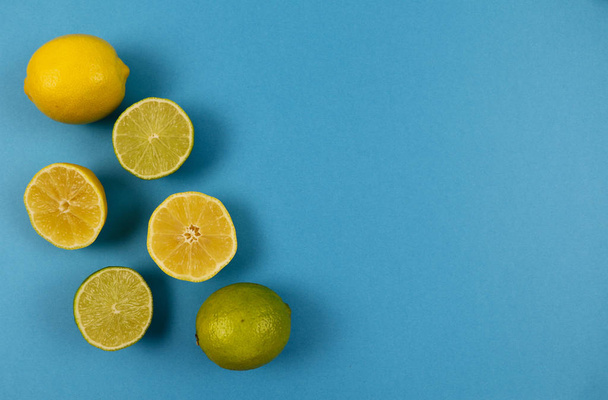 citrus on a blue background upside - Valokuva, kuva