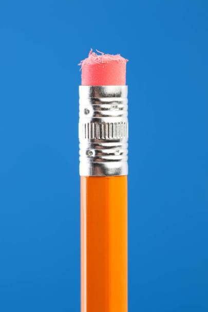 Close up of a used single yellow pencil eraser - Photo, Image