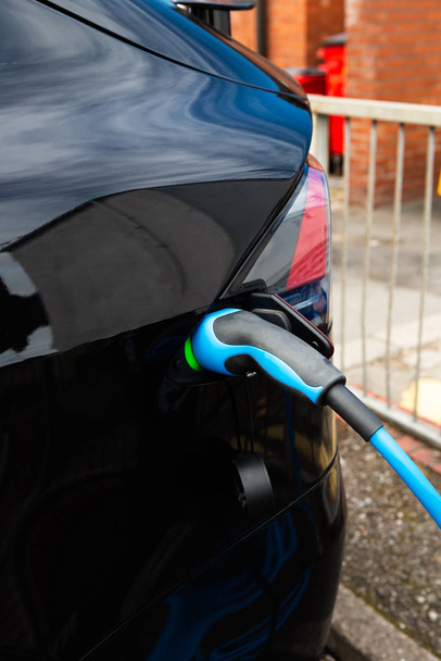 Modern electric car is charging - Photo, Image