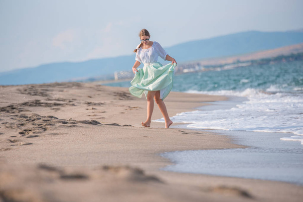 Girl fun on the beach - Фото, зображення