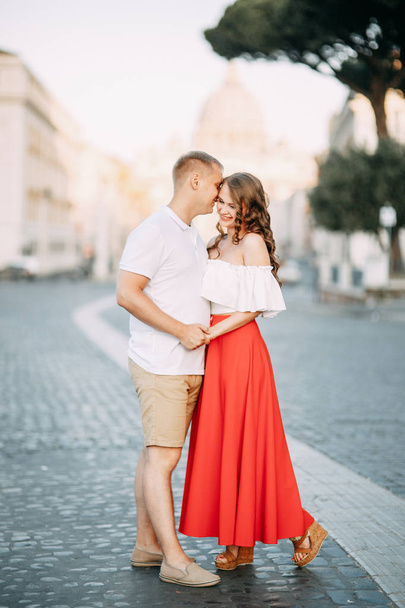Stylish loving couple walking and laughing. Wedding shooting on the streets of Rome, Italy.  - Foto, immagini