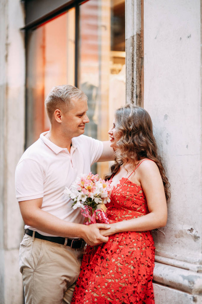 Stylish loving couple walking and laughing. Wedding shooting on the streets of Rome, Italy.  - 写真・画像