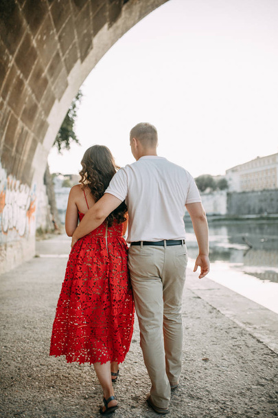 Stylish loving couple walking and laughing. Wedding shooting on the streets of Rome, Italy.  - Φωτογραφία, εικόνα