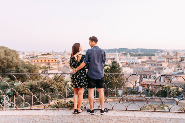 Wedding photography in Italy. Couple walking the streets of Rome, sightseeing and panoramic views.  - Foto, imagen