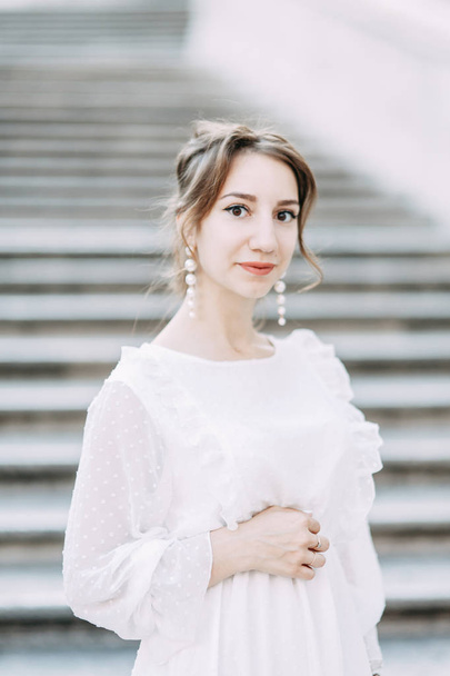 Wedding photo shoot of the bride in Italy. Portrait of a stylish girl on the streets of Rome.  - Photo, Image