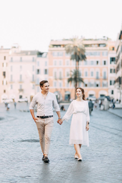  Beautiful stylish pair of in the European style. Wedding photo shoot on the streets of Rome. - Valokuva, kuva