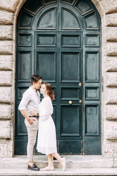  Beautiful stylish pair of in the European style. Wedding photo shoot on the streets of Rome. - Photo, image