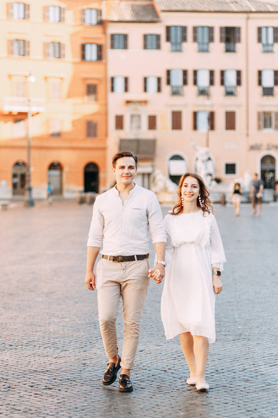  Beautiful stylish pair of in the European style. Wedding photo shoot on the streets of Rome. - Zdjęcie, obraz