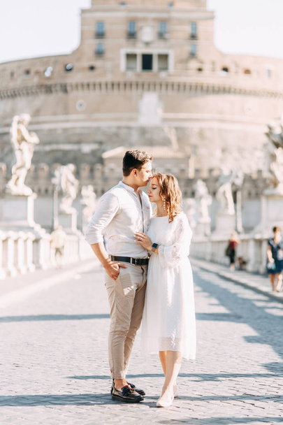  Beautiful stylish pair of in the European style. Wedding photo shoot on the streets of Rome. - 写真・画像