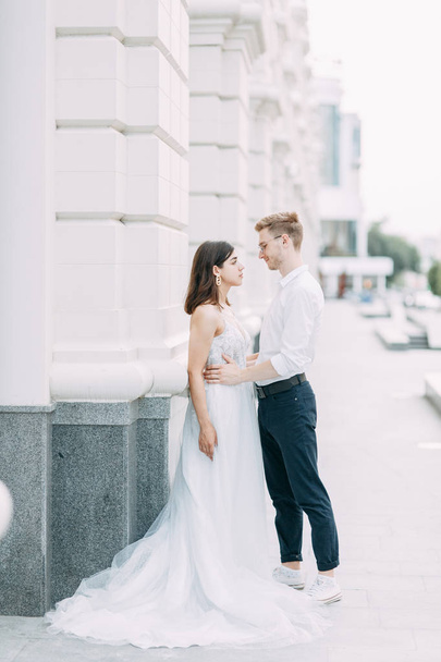  Couple on the streets. A stylish wedding in the European style of fine art. - Fotografie, Obrázek