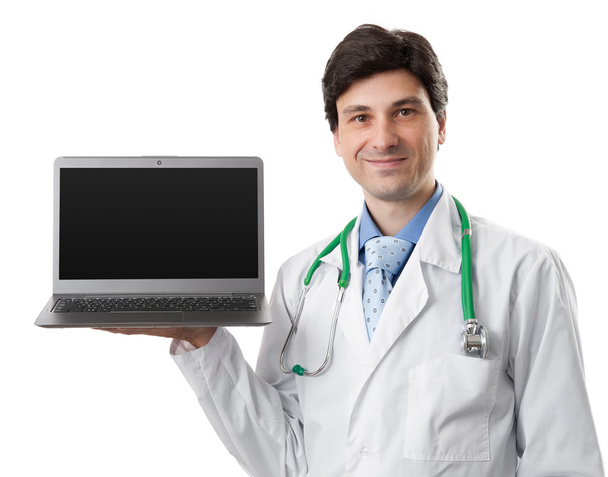 doctor holding a laptop with blank screen - Zdjęcie, obraz
