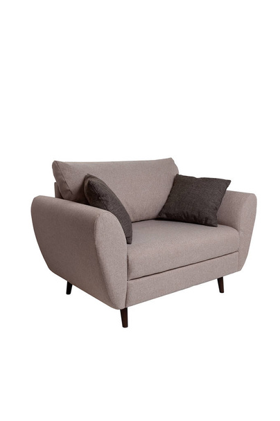白い背景に隔離された枕が付いている現代の小さい灰色の生地のソファ。厳格なスタイルの家具 - 写真・画像