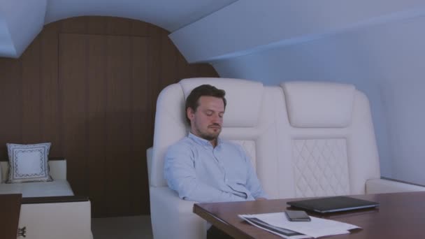 Sleeping at private jet. - Felvétel, videó